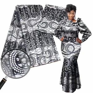 Beautiful black and white Organza fabric for dress, party dress and top.